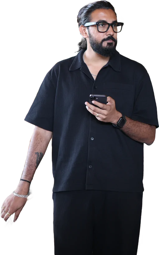 Yuvraj Raskar in a dark shirt, cut out and standing against the column of text.